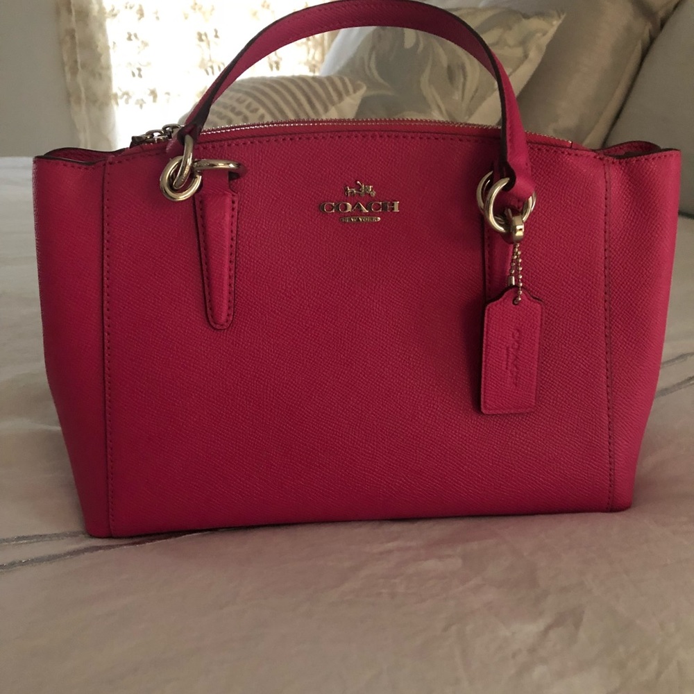 Coach pink crossbody bag